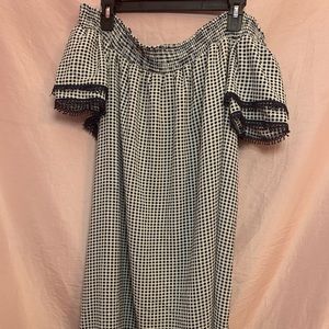 Black and white checkered dress. Goes to knee